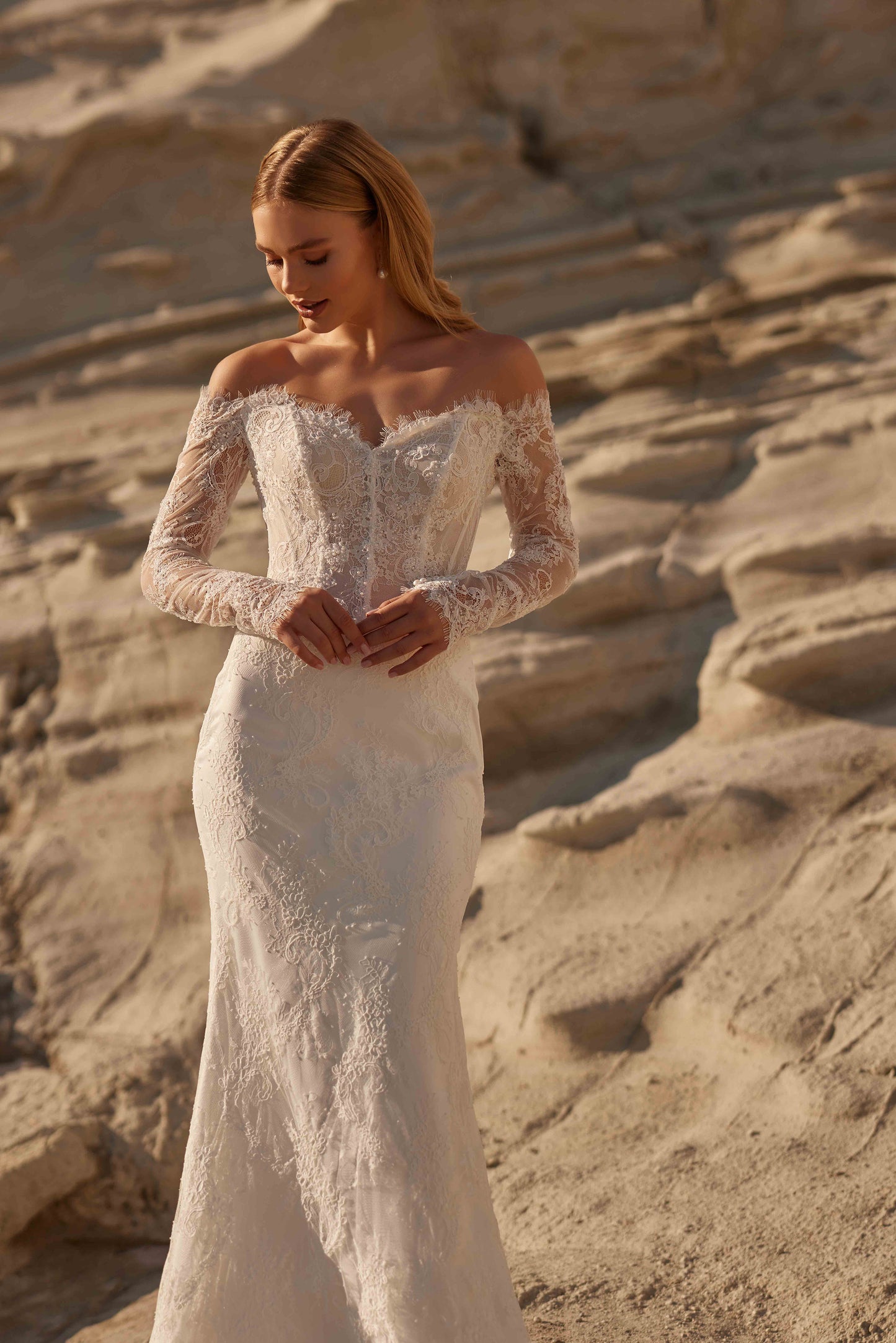 Heart-neck, long-sleeved, fully embroidered lace wedding dress with a detachable tulle skirt in a mermaid style - 25181